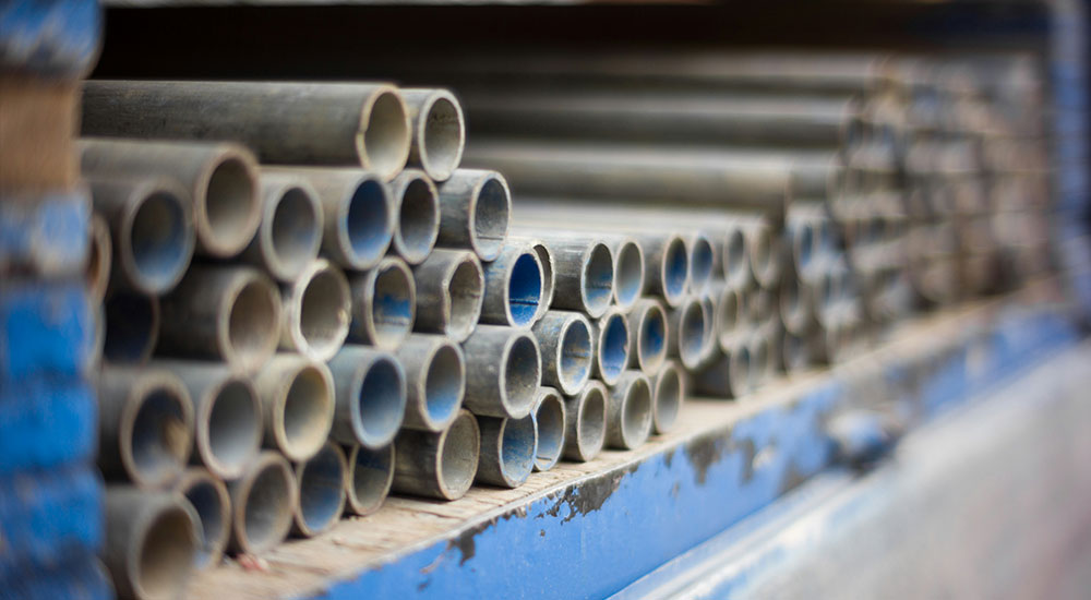 Comparison of large commercial pipes and smaller residential pipes
