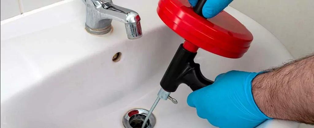 How to unclog my kitchen sink with a drum snake 